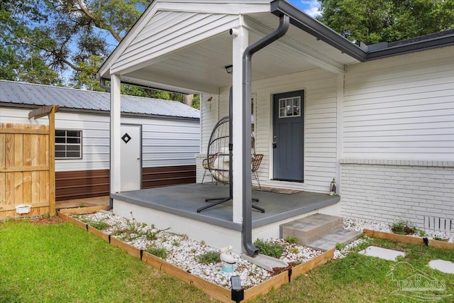 202 Henry St, Pensacola, FL 32507 - entrance to property featuring a porch and brick siding