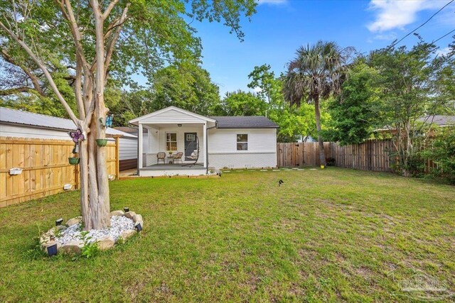 202 Henry St, Pensacola, FL 32507 - rear view of property with a patio