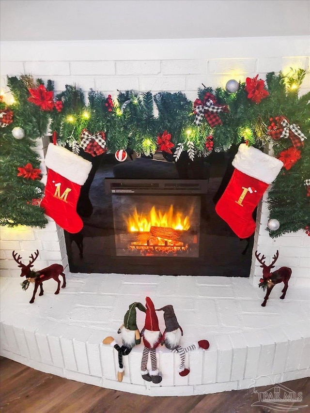 202 Henry St, Pensacola, FL 32507 - detailed view of a warm lit fireplace