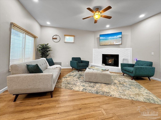 202 Henry St, Pensacola, FL 32507 - living area with ceiling fan, baseboards, a brick fireplace, wood finished floors, and recessed lighting