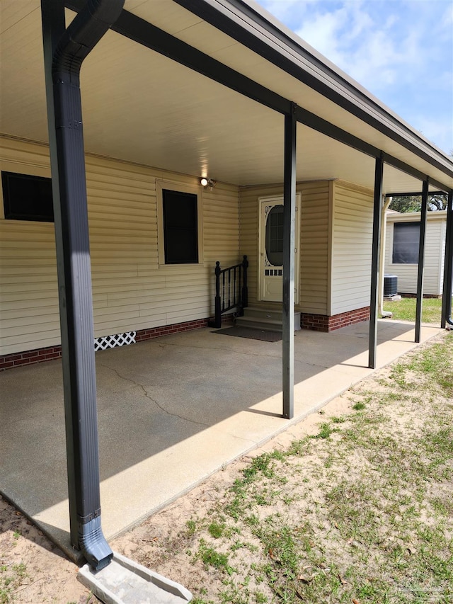 view of patio / terrace featuring a carport