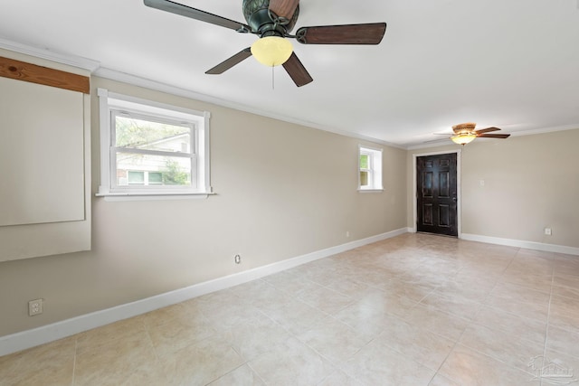 unfurnished room featuring baseboards, ornamental molding, and ceiling fan