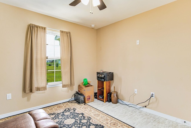 miscellaneous room featuring a healthy amount of sunlight and ceiling fan