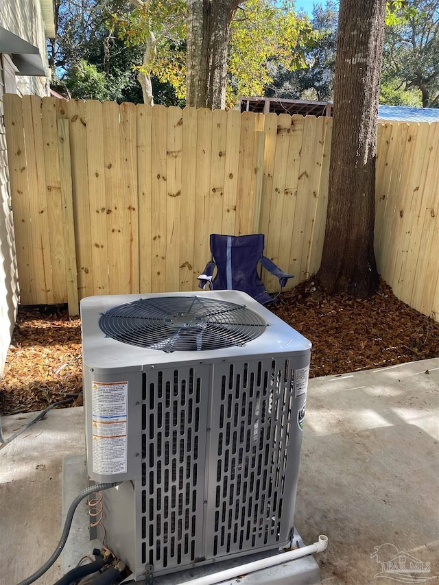 exterior details featuring central AC