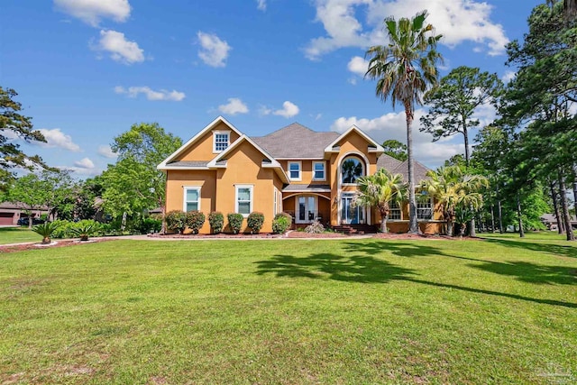 craftsman house with a front lawn