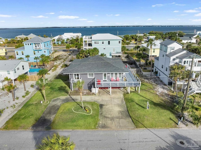 drone / aerial view featuring a water view