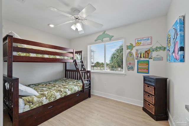 bedroom featuring ceiling fan and light hardwood / wood-style flooring