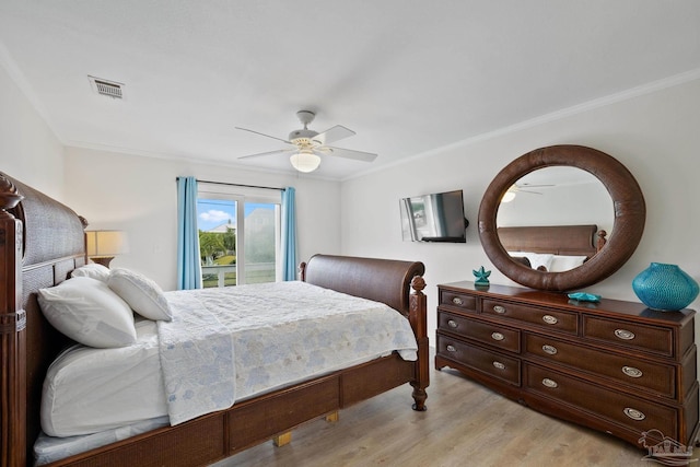 bedroom with access to exterior, ceiling fan, light hardwood / wood-style floors, and ornamental molding