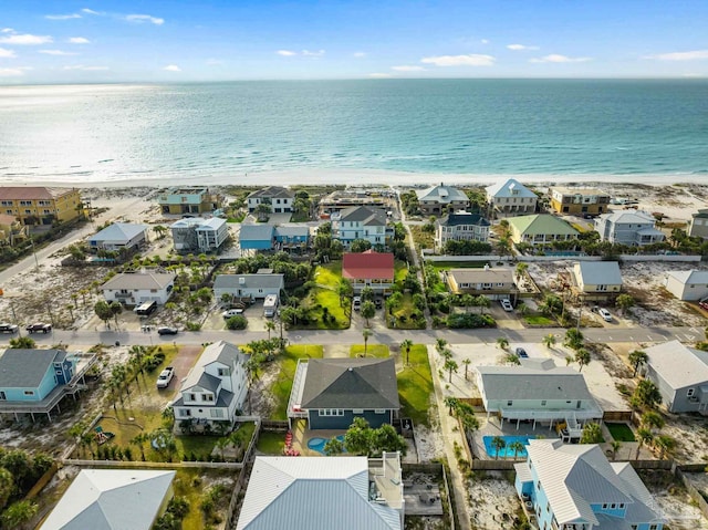 aerial view with a view of the beach and a water view