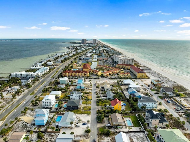 birds eye view of property featuring a water view and a view of the beach