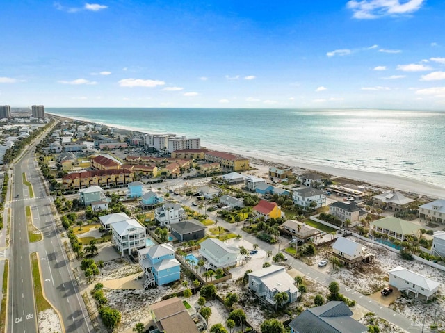 bird's eye view featuring a beach view and a water view