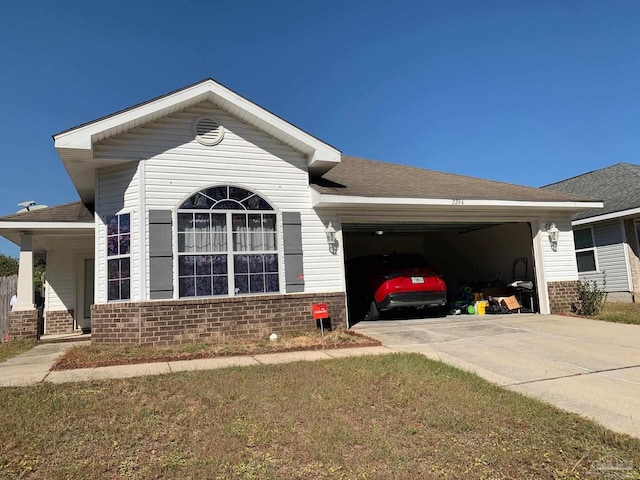 single story home with a garage and a front lawn