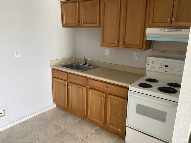 kitchen featuring sink, white electric stove, and light tile patterned flooring