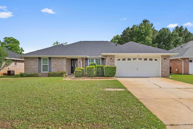 ranch-style home featuring a front lawn, brick siding, and an attached garage