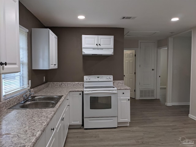 kitchen featuring sink, light hardwood / wood-style flooring, white range with electric stovetop, and white cabinetry