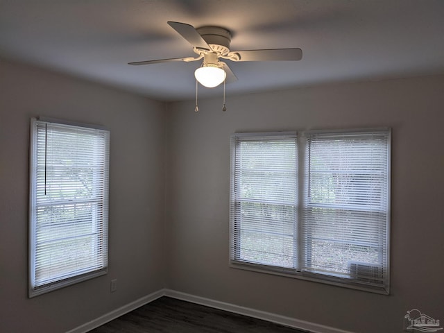 unfurnished room with hardwood / wood-style flooring and ceiling fan