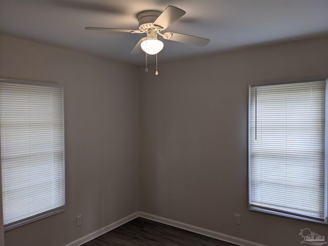 spare room with ceiling fan and hardwood / wood-style floors