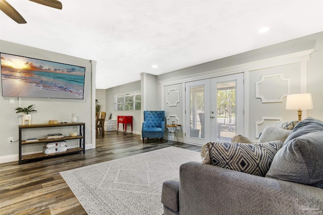 living room featuring dark wood-type flooring, ceiling fan, and french doors