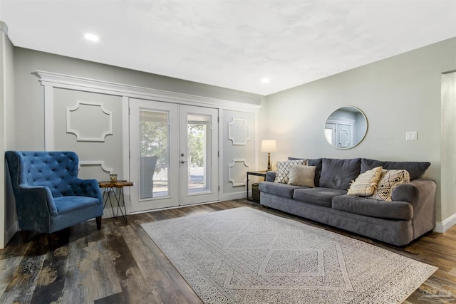 living room featuring dark wood-type flooring and french doors