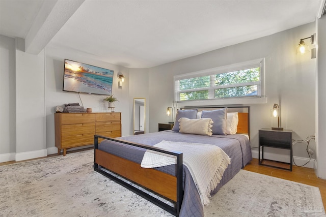 bedroom with light wood-type flooring