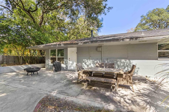 view of patio featuring grilling area and an outdoor fire pit