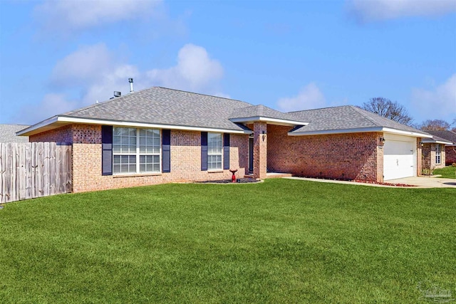 ranch-style home featuring a front yard, an attached garage, fence, and brick siding