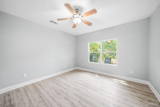 unfurnished room with light hardwood / wood-style floors and ceiling fan