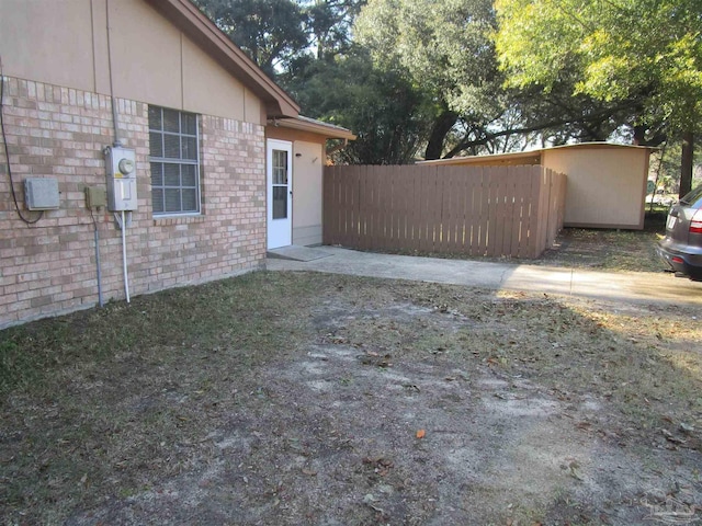 view of yard with fence