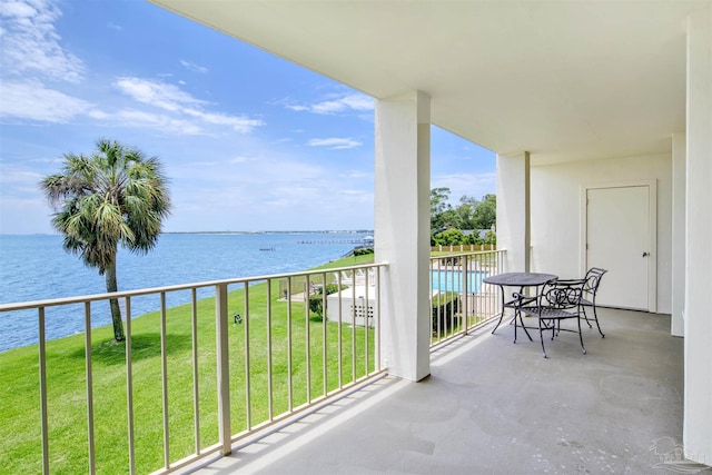 balcony featuring a water view