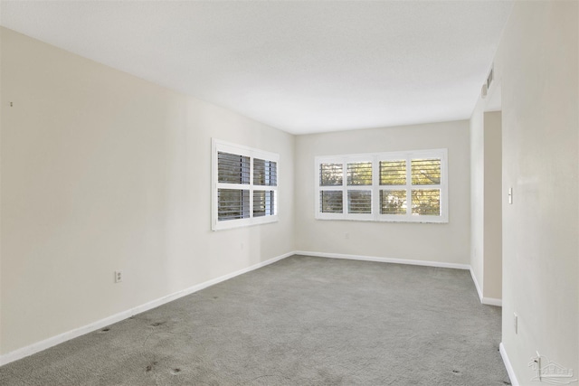 view of carpeted spare room