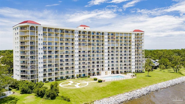 view of building exterior featuring a water view