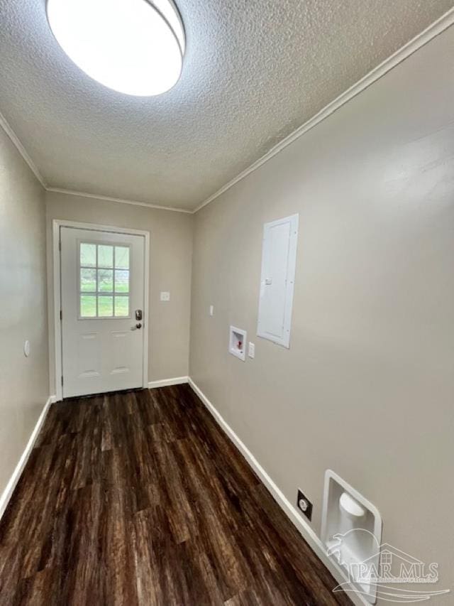 doorway to outside with electric panel, baseboards, dark wood finished floors, a textured ceiling, and crown molding