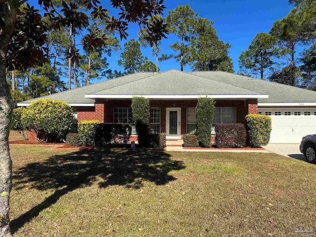 ranch-style home with a front lawn and a garage