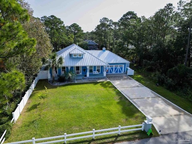 view of front of property with a porch and a front lawn