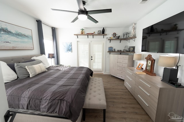 bedroom with ceiling fan and dark hardwood / wood-style flooring