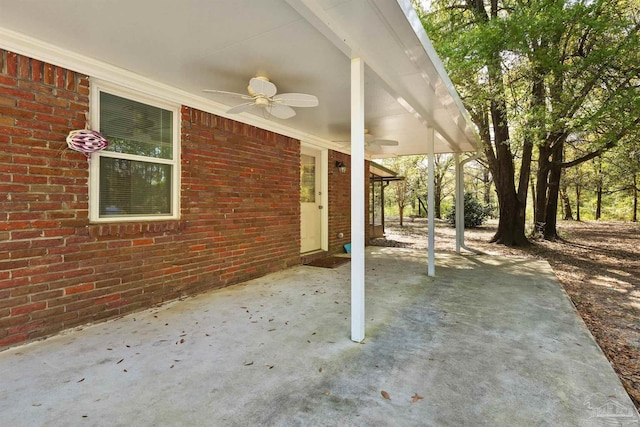 view of patio featuring an attached carport and ceiling fan