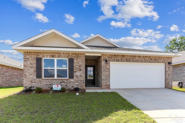 2697 Avalon St, Cantonment, FL 32533 - single story home with brick siding, a front lawn, driveway, and a garage