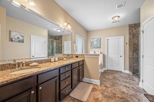 8847 Salt Grass Dr, Pensacola, FL 32526 - full bathroom featuring visible vents, a sink, a bath, and a shower stall