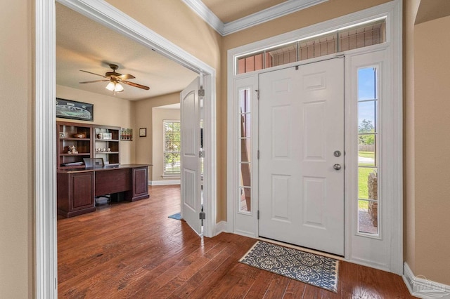 8847 Salt Grass Dr, Pensacola, FL 32526 - foyer entrance with crown molding, a ceiling fan, baseboards, and wood finished floors