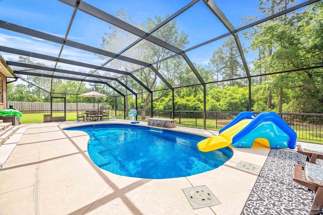 8847 Salt Grass Dr, Pensacola, FL 32526 - view of swimming pool featuring a fenced in pool, a fenced backyard, outdoor dining area, a lanai, and a patio