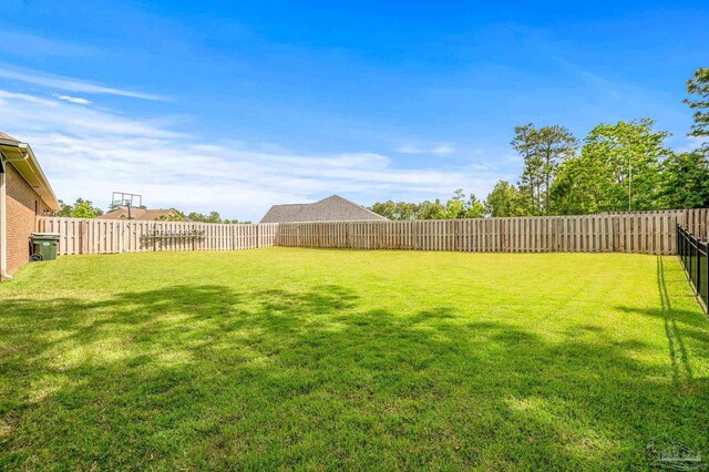 8847 Salt Grass Dr, Pensacola, FL 32526 - view of yard featuring a fenced backyard