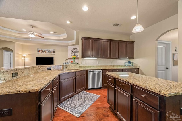 8847 Salt Grass Dr, Pensacola, FL 32526 - kitchen with ceiling fan, visible vents, arched walkways, stainless steel dishwasher, and a sink