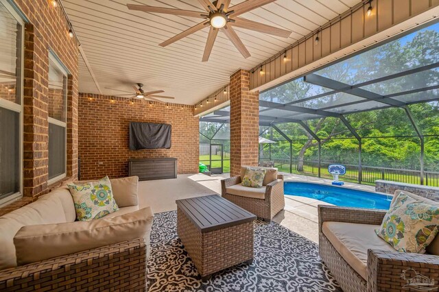 8847 Salt Grass Dr, Pensacola, FL 32526 - view of patio / terrace featuring a fenced in pool, glass enclosure, ceiling fan, and an outdoor living space