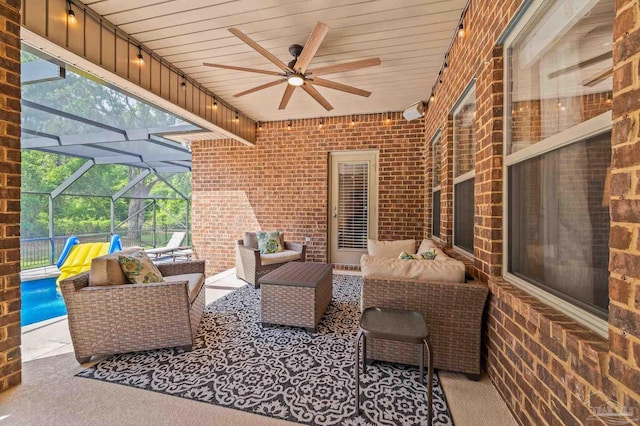 8847 Salt Grass Dr, Pensacola, FL 32526 - view of patio / terrace with a ceiling fan, a lanai, and an outdoor living space