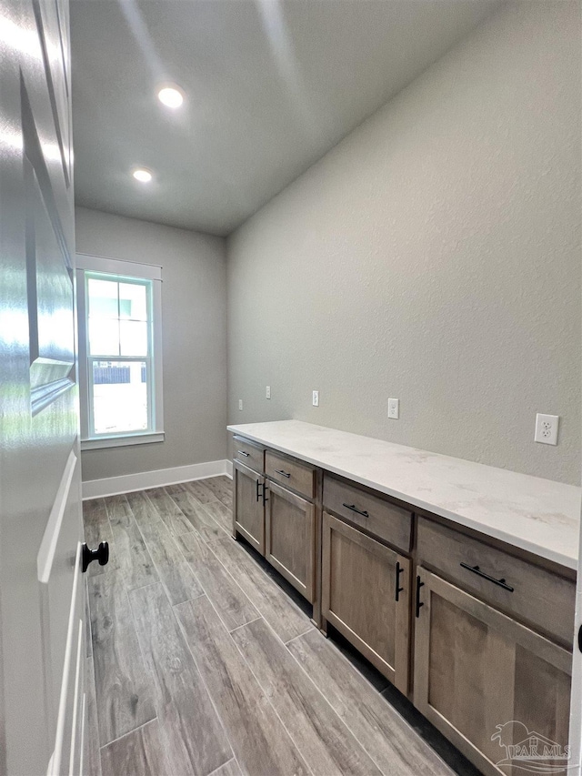 2440 Meeting St, Cantonment, FL 32533 - clothes washing area with light wood-type flooring
