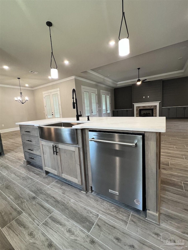 2440 Meeting St, Cantonment, FL 32533 - kitchen featuring french doors, sink, hanging light fixtures, dishwasher, and a kitchen island with sink