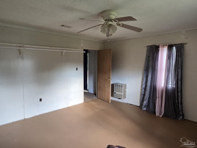 35 N Cypress St, Mcdavid, FL 32568 - unfurnished room featuring heating unit, ceiling fan, and a textured ceiling