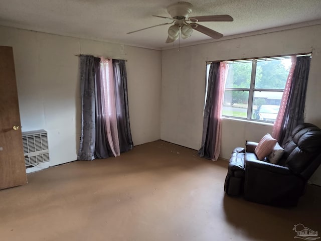 35 N Cypress St, Mcdavid, FL 32568 - living area with concrete flooring and a ceiling fan