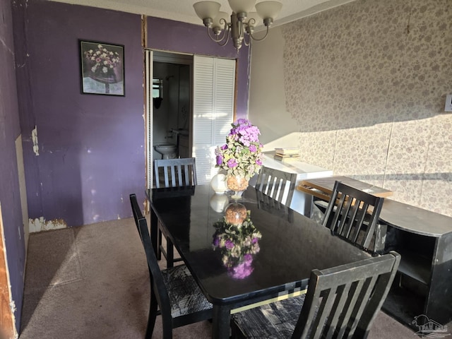 35 N Cypress St, Mcdavid, FL 32568 - dining area with a chandelier and carpet floors