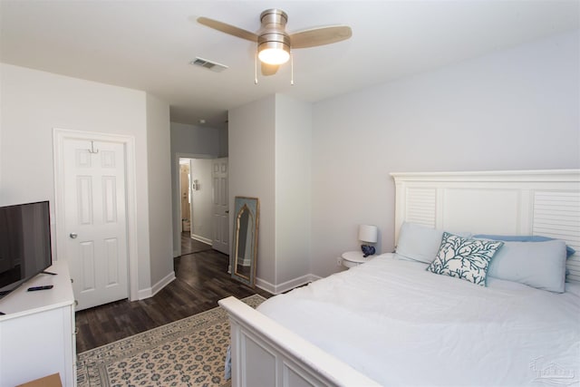 bedroom featuring ceiling fan and dark hardwood / wood-style flooring